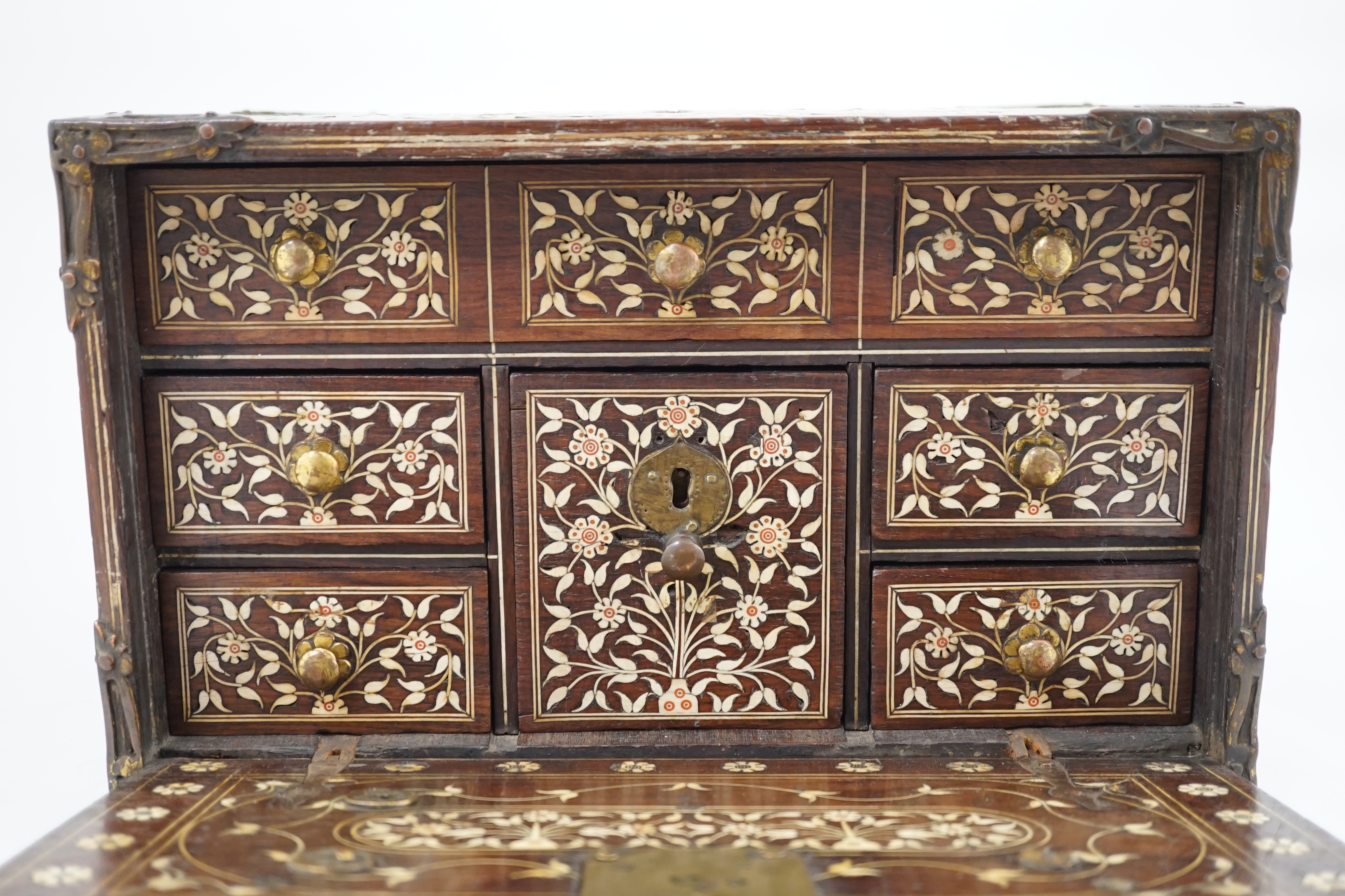 An early 17th century Indo-Portuguese ivory inset hardwood travelling chest